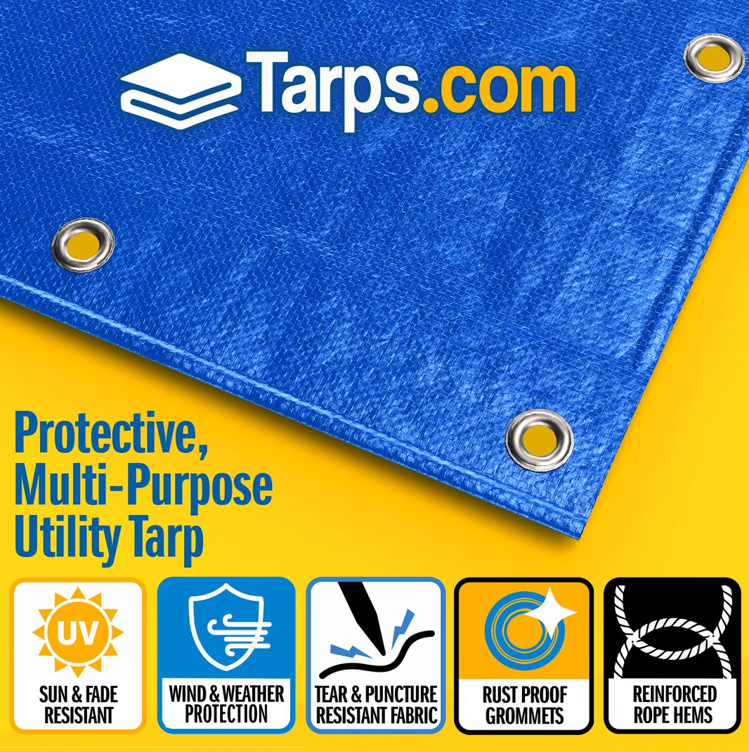 Close view of reinforced woven polyethylene tarp material with metal grommets